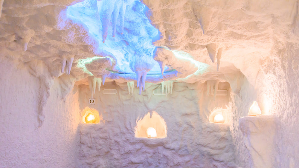 Salt room. Halotherapy for treatment of respiratory diseases. Salt cave with multicolored LED back lighting.
